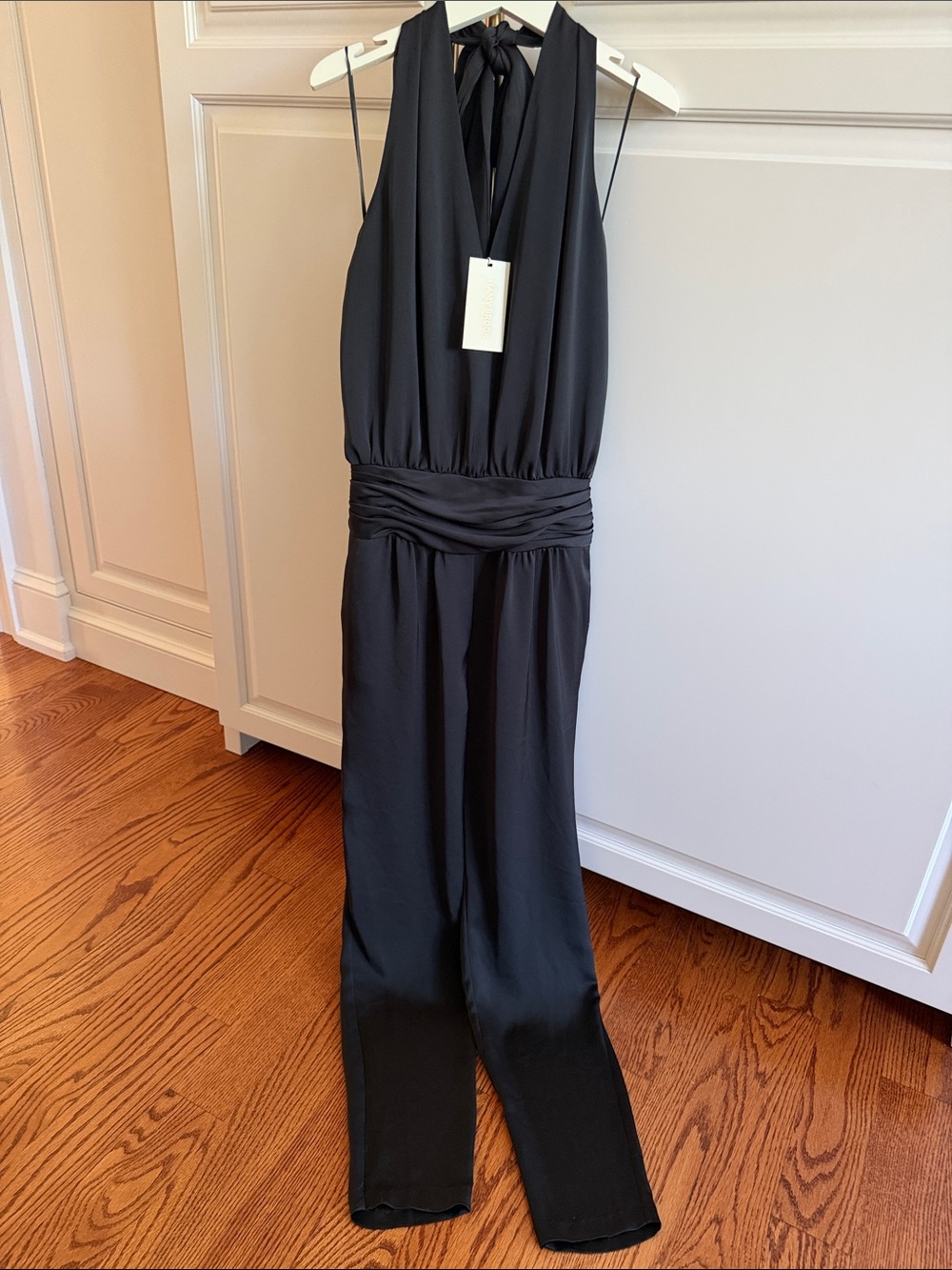 Ramy Brook Black satiny Halter Jumpsuit tied various ways. Pockets S NWT